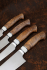 Набор ножей на подставке из акрила белого коричневая карельская береза, сталь S390 Bohler